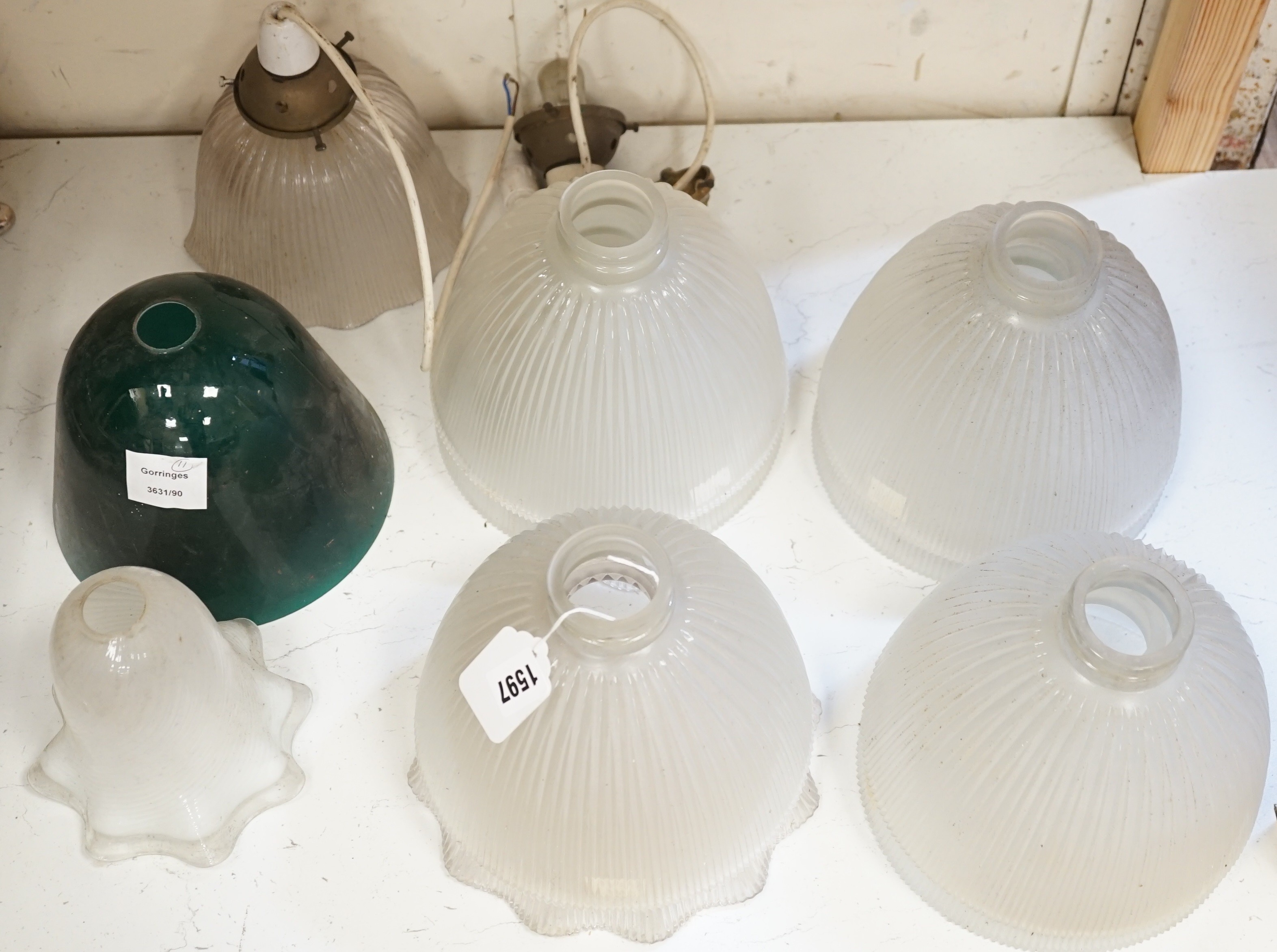 A collection of 11 late 19th/early 20th century glass light shades